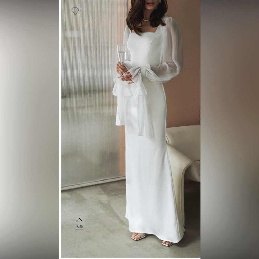 Long, white maxi gown. perfect for engagements.